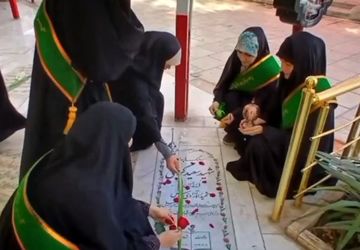 ادای احترام دختران دهه هشتادی به شهدا 