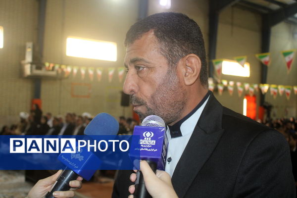 نواختن زنگ آغاز سال تحصیلی در دبیرستان شهیده سهام خیام  شاهد بوشهر