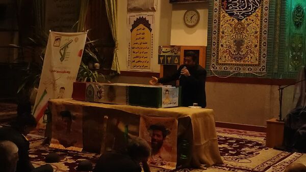  مراسم وداع با پیکر شهید جواد حسن زاده در مسجد امام علی(ع)