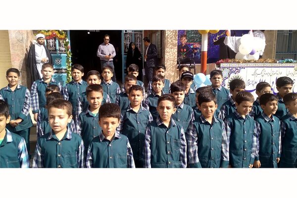 نواختن زنگ بازگشایی مدارس در دبستان علی بن ابیطالب(ع) باقرشهر