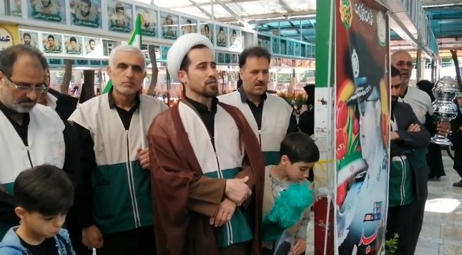 ادای احترام خادمیاران رضوی قم به مزار شهدا