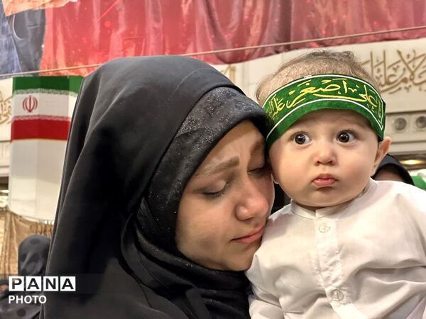 آیین شیرخوارگان حسینی با حضور همسران شهدا در قم