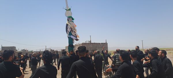 عزاداری ظهر عاشورا در روستای حسن آباد بلهر 