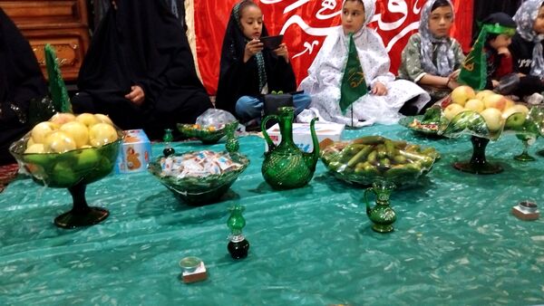 برپایی سفره حضرت‌رقیه (س) در شهر وردنجان