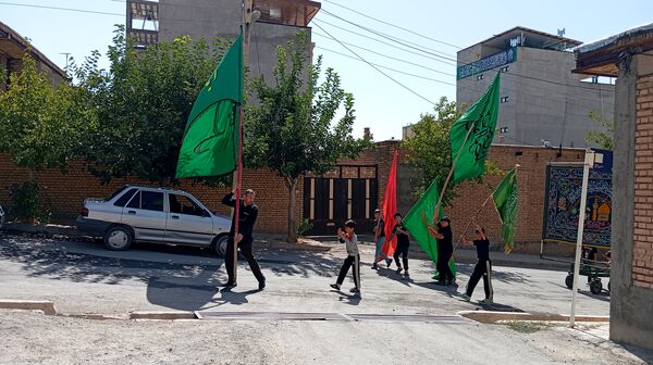 خیابان‌های بن، رنگ ماتم گرفت: تشییع نمادین پیکر امام هشتم