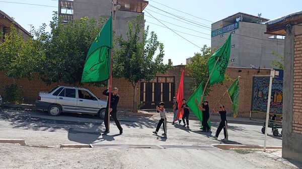 خیابان‌های بن، رنگ ماتم گرفت: تشییع نمادین پیکر امام هشتم