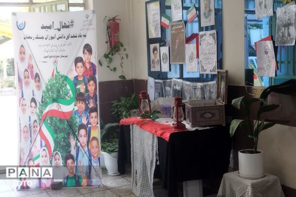  آیین کاشت نهال امید به یاد شهدای دانش‌آموز جنگ رمضان در دبیرستان فتح المبین شهرری 