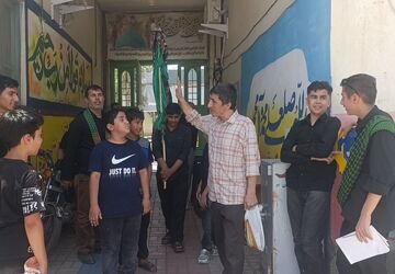 سنت‌های ماندگار؛ علم‌گردانی و توزیع نذورات در آشخانه