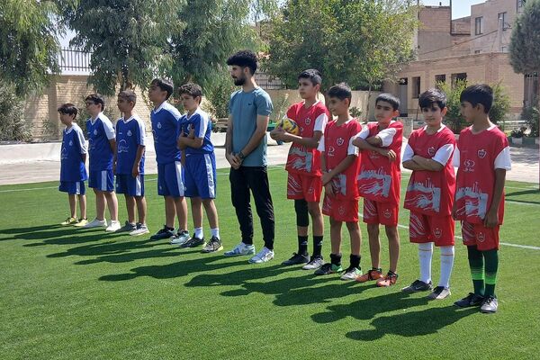 آیین افتتاحیه زمین چمن مصنوعی دبستان علی بن ابیطالب (ع) باقرشهر 