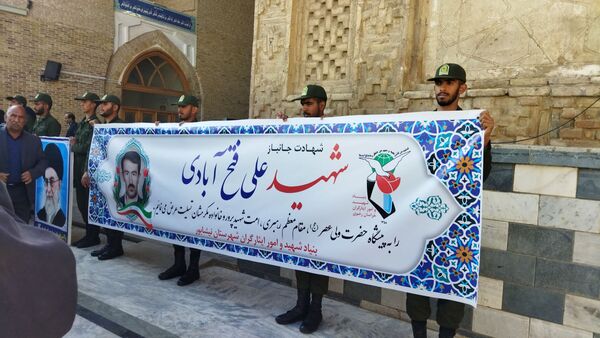 تشییع پیکر جانباز شهید علی فتح آبادی در نیشابور 